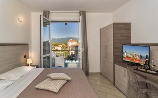 Comfort Double or Twin Room | Minibar, in-room safe, desk, laptop workspace