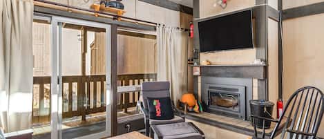 Smart TV, fireplace, DVD player, books