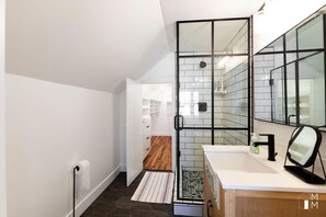 Shower, hair dryer, towels, soap