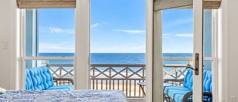 Primary suite includes an ensuite bath and access to your private ocean-view patio.