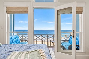 Primary suite includes an ensuite bath and access to your private ocean-view patio.