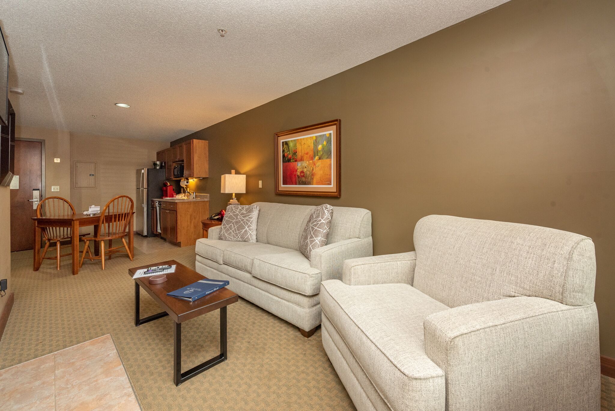 Suites at Silver Tree A116: 1 bedroom standard view suite with fireplace, kitche