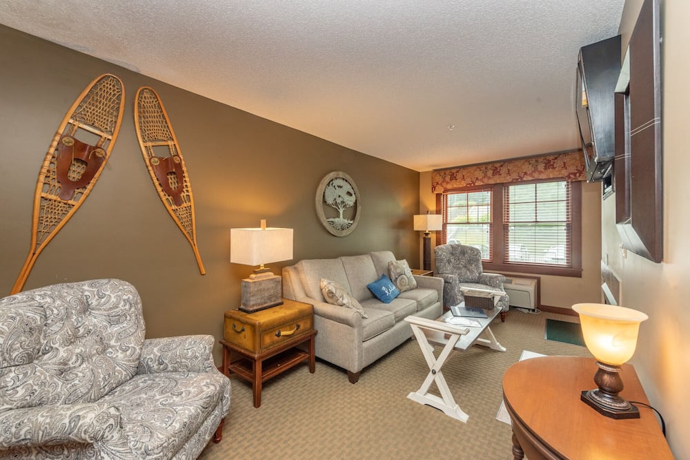Suites at Silver Tree A208: One bedroom suite, standard view with a cozy firepla