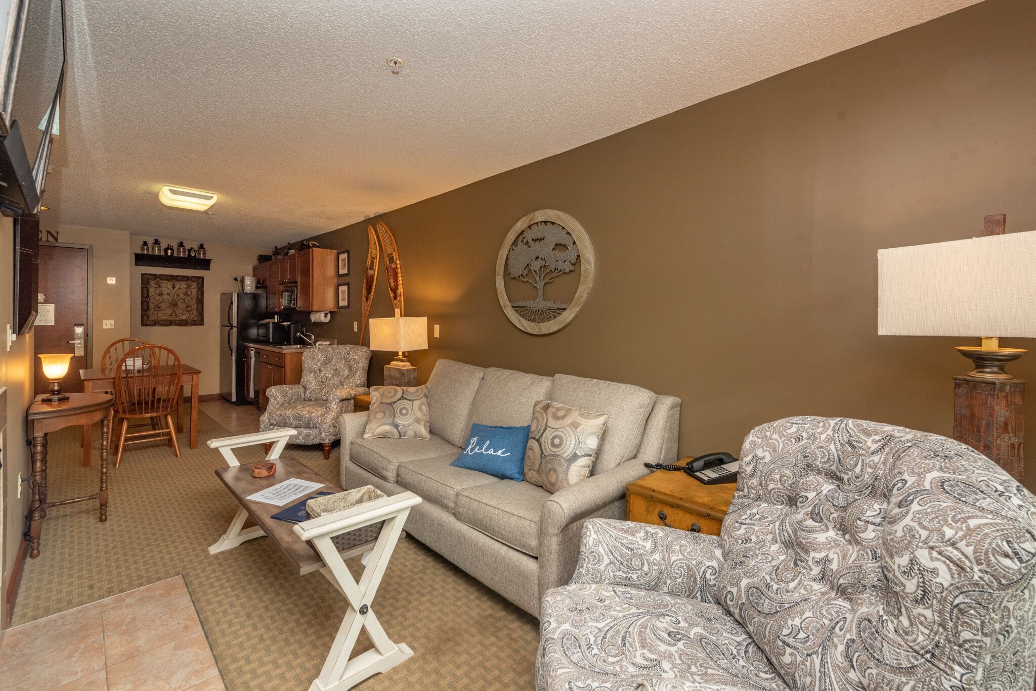 Suites at Silver Tree A208: One bedroom suite, standard view with a cozy firepla