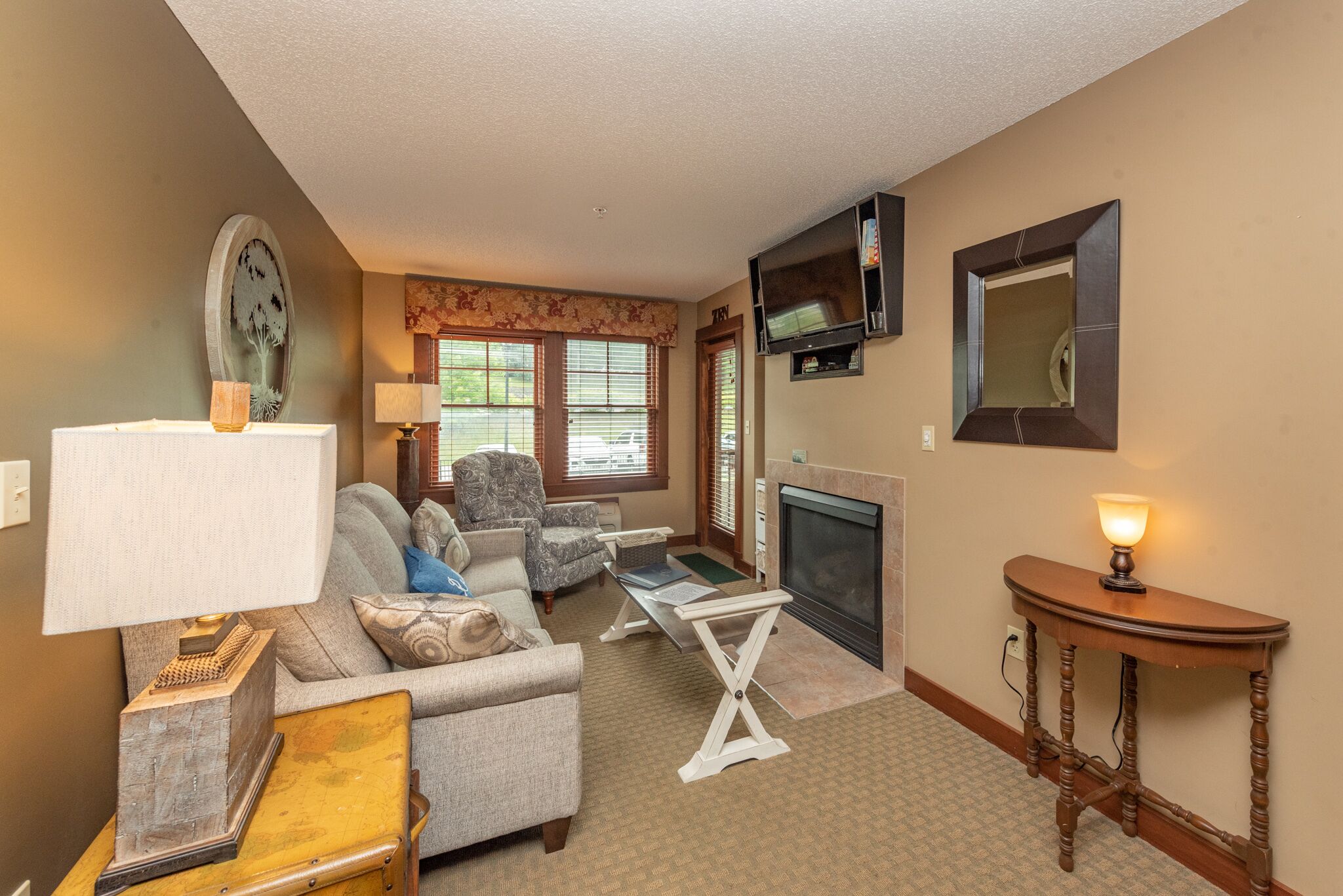 Suites at Silver Tree A208: One bedroom suite, standard view with a cozy firepla