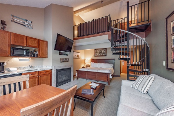 Flat-screen TV, fireplace, video games, DVD player