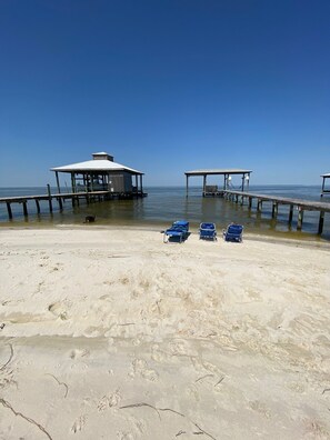 On the beach, sun-loungers, beach towels