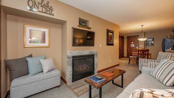 Flat-screen TV, fireplace, video games, DVD player