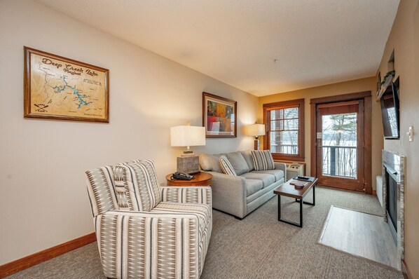 Flat-screen TV, fireplace, video games, DVD player