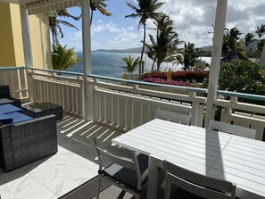 Outdoor dining - Oceanfront, Remodeled 2BR- 2 King Size Beds / 2BA Condo at Ocean's View (Christiansted)