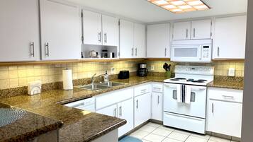 Coffee/tea maker, fridge, microwave, oven