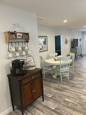 Complimentary coffee bar and dining area