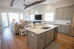 Oven, cookware/dishes/utensils - Seagull Street Duplex by Sea Scape Properties (Wrightsville Beach)