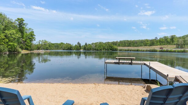 A lakeside view with a dock and chairs. - Lake Front, NEW Sandy Beach, Big Buck Hunter & Pac-Man Arcade Games! Near Nisswa (Pequot Lakes)