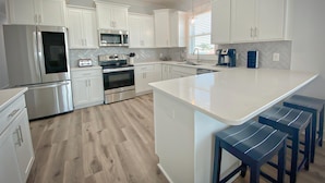 Duplex, 4 Bedrooms | Private kitchen - Pier Reviewed by Sea Scape Properties (Carolina Beach)