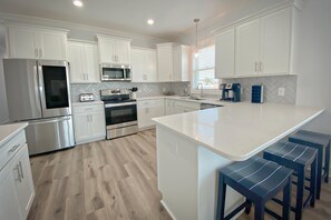 Duplex, 4 Bedrooms | Private kitchen | Oven - Pier Reviewed by Sea Scape Properties (Carolina Beach)