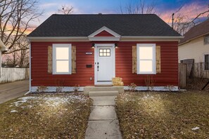 Exterior detail - Spacious 3BR Getaway Near Downtown & MSU w/ Game Room for a Cozy Winter Retreat (Lansing)