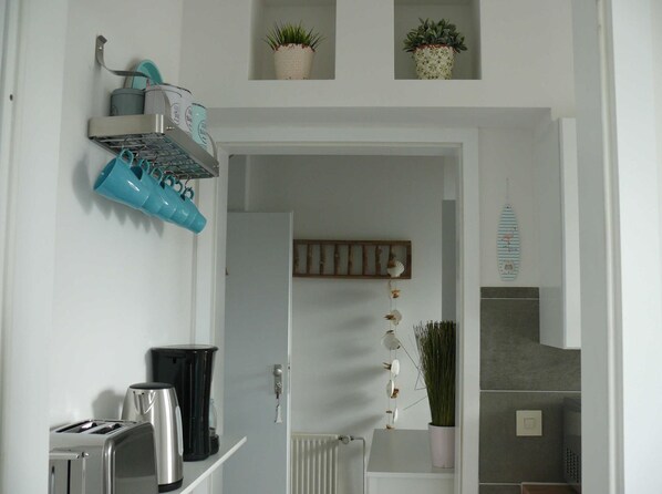 Fridge, microwave, stovetop, coffee/tea maker