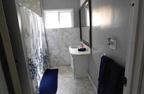 Hair dryer, towels, soap, shampoo