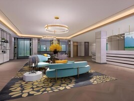 A modern interior with a curved sofa, a chandelier, and a large window.