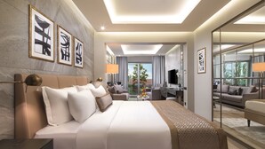 A modern hotel room with a large bed, a desk, a sofa, and a balcony with a view. - Mula Hotel - Special Class (Istanbul)