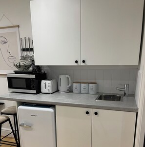 Fridge, microwave, stovetop, electric kettle