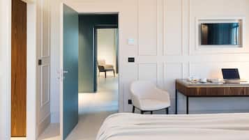Suite ejecutiva | 1 habitación, minibar, caja de seguridad en la habitación y escritorio