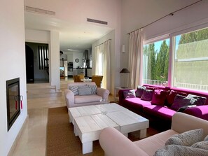 TV, fireplace - Villa Oleandro with Mountain Views, Pool, Garden and Wi-Fi (Benalup Casas Viejas)
