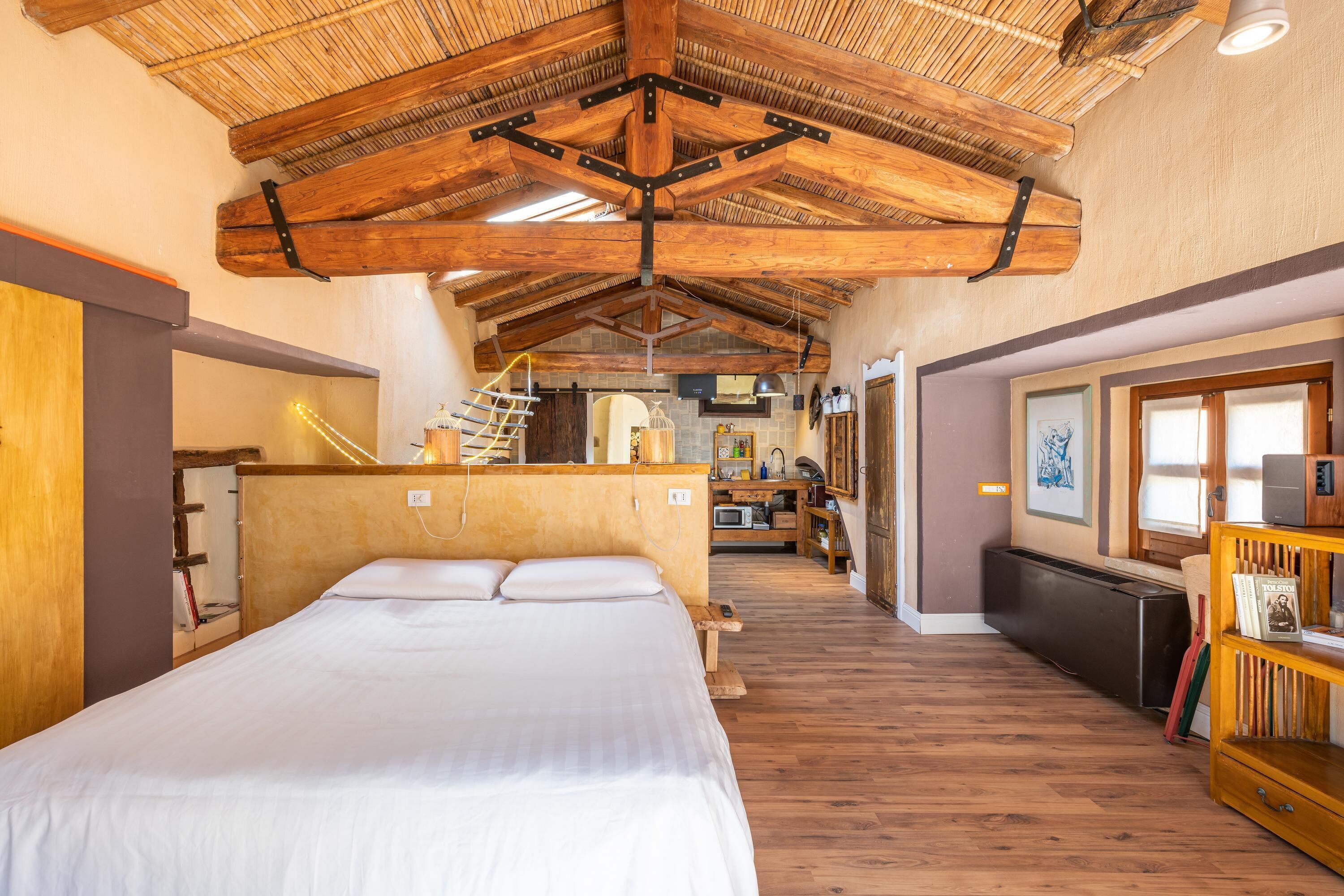 Studio Apartment 'Loft Borgo Anninnia' with Terrace, Shared Garden & Wi-Fi