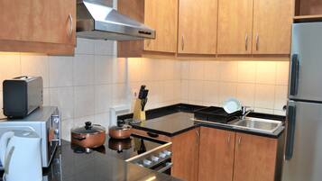 Estúdio | Cozinha privada | Geladeira grande, micro-ondas, fogão, cooktop