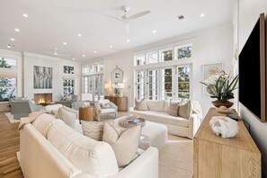 TV, fireplace - Private Pool, Lake Views , 6 Seat Golf Cart/LSV | Lake District Home in Watercolor, FL (Santa Rosa Beach)