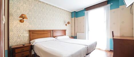 Desk, free WiFi, bed sheets