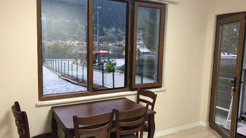 Family Apartment | Living area | 8-inch TV with cable channels
