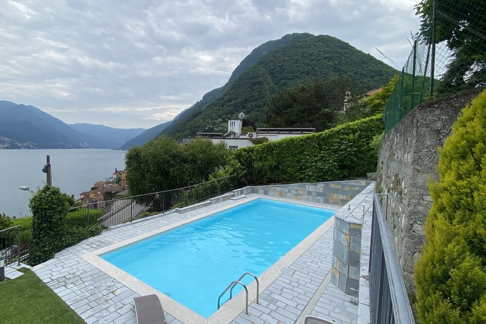 Modern duplex apartment with magic views and pool over the lake.