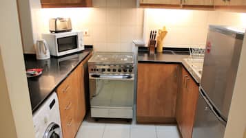 Estúdio | Cozinha privada | Geladeira grande, micro-ondas, fogão, cooktop