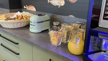 Desayuno buffet diario (EUR 14 por persona)