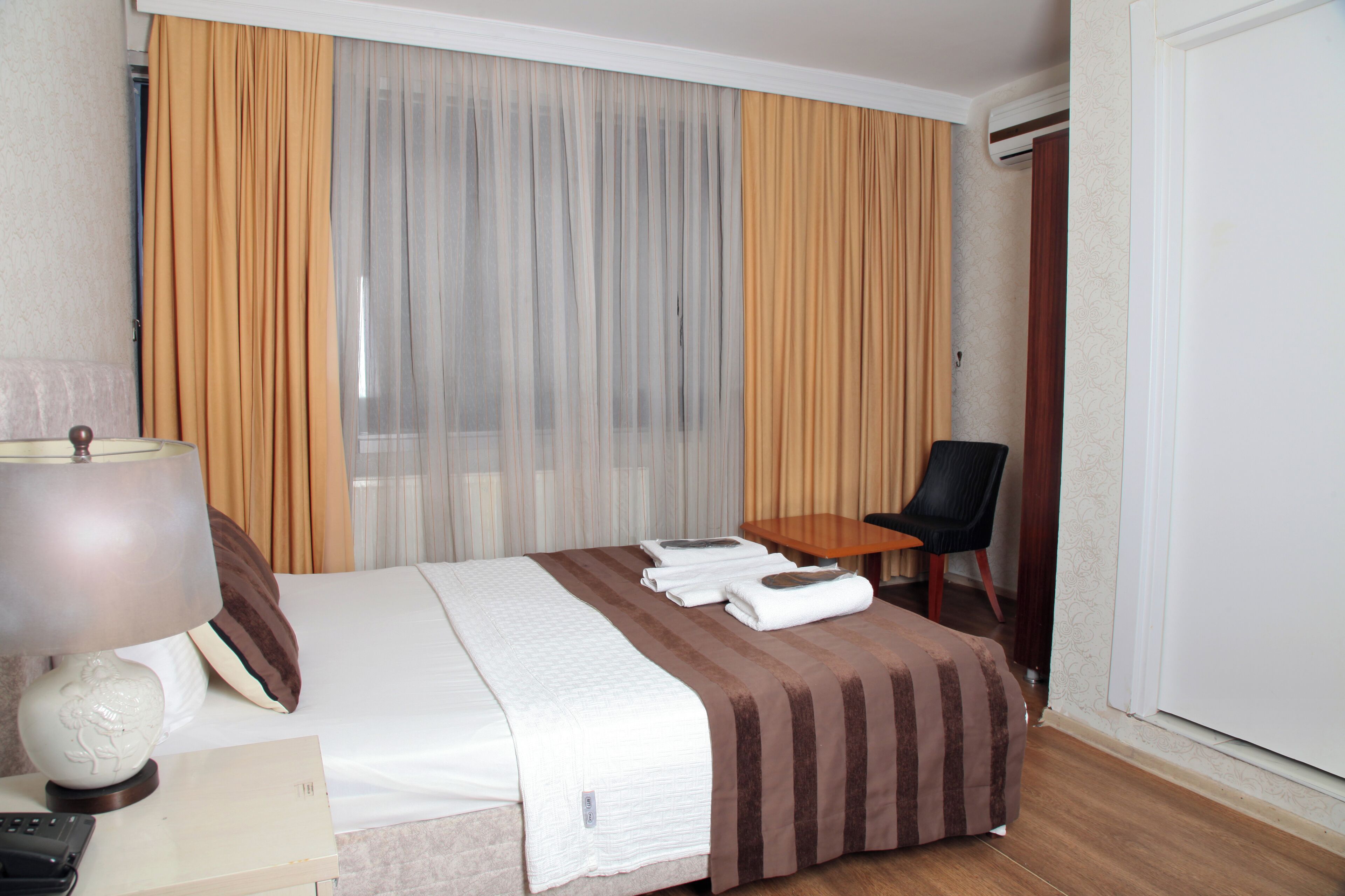 Premium bedding, free minibar items, desk, blackout drapes