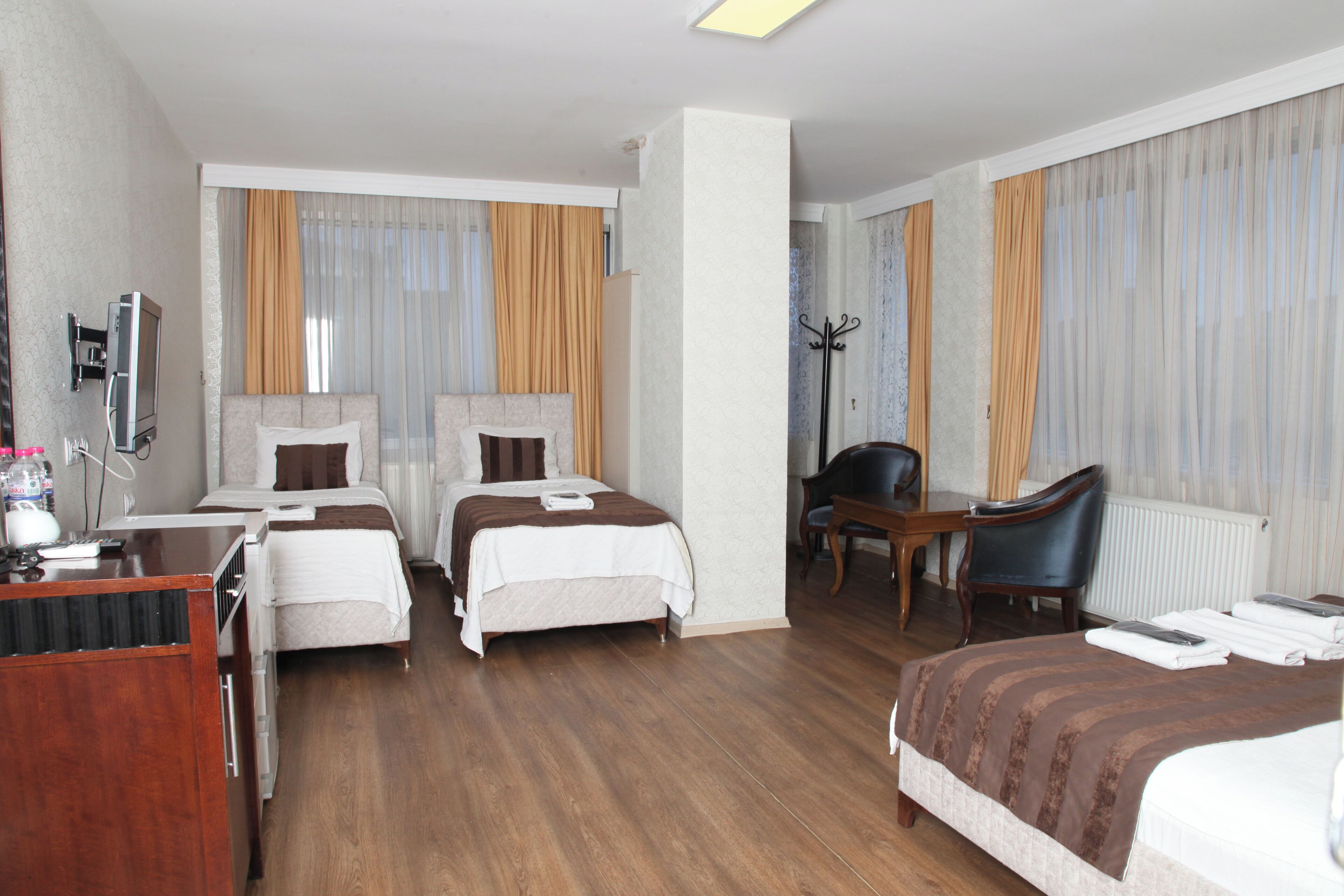 Family Room, City View | Premium bedding, minibar (some free items), desk, blackout drapes