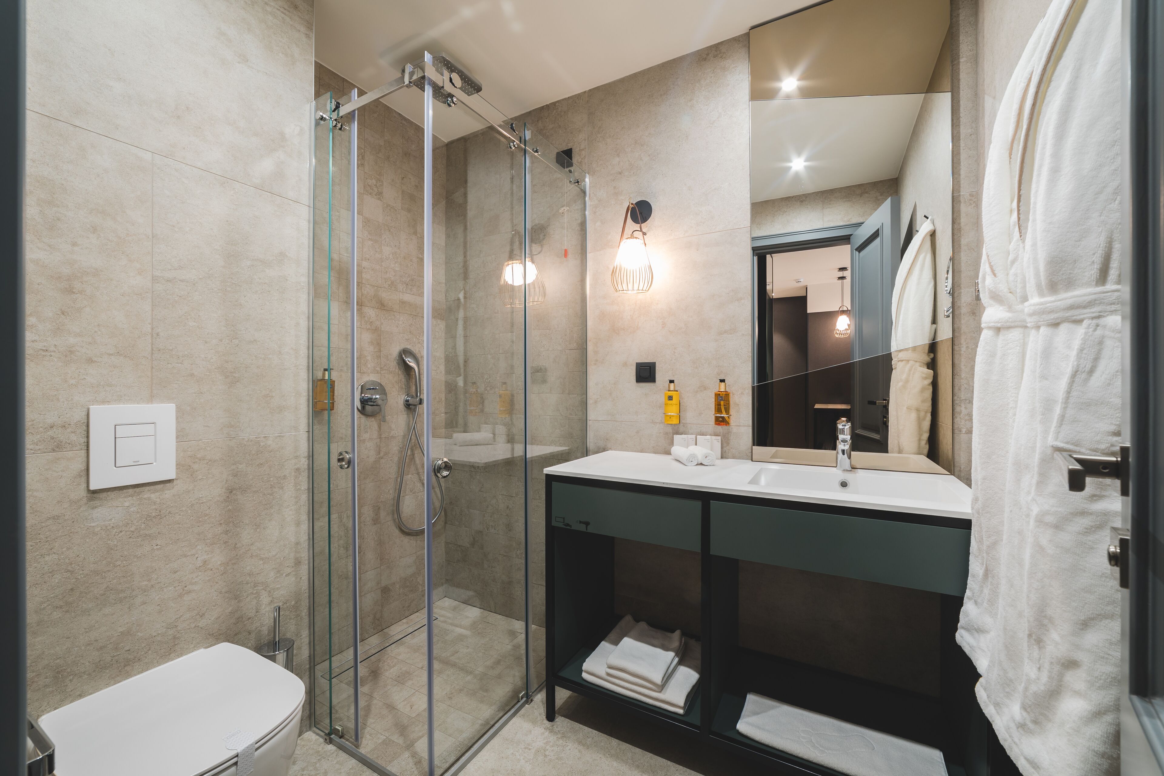 shower, rainfall showerhead, designer toiletries, hair dryer