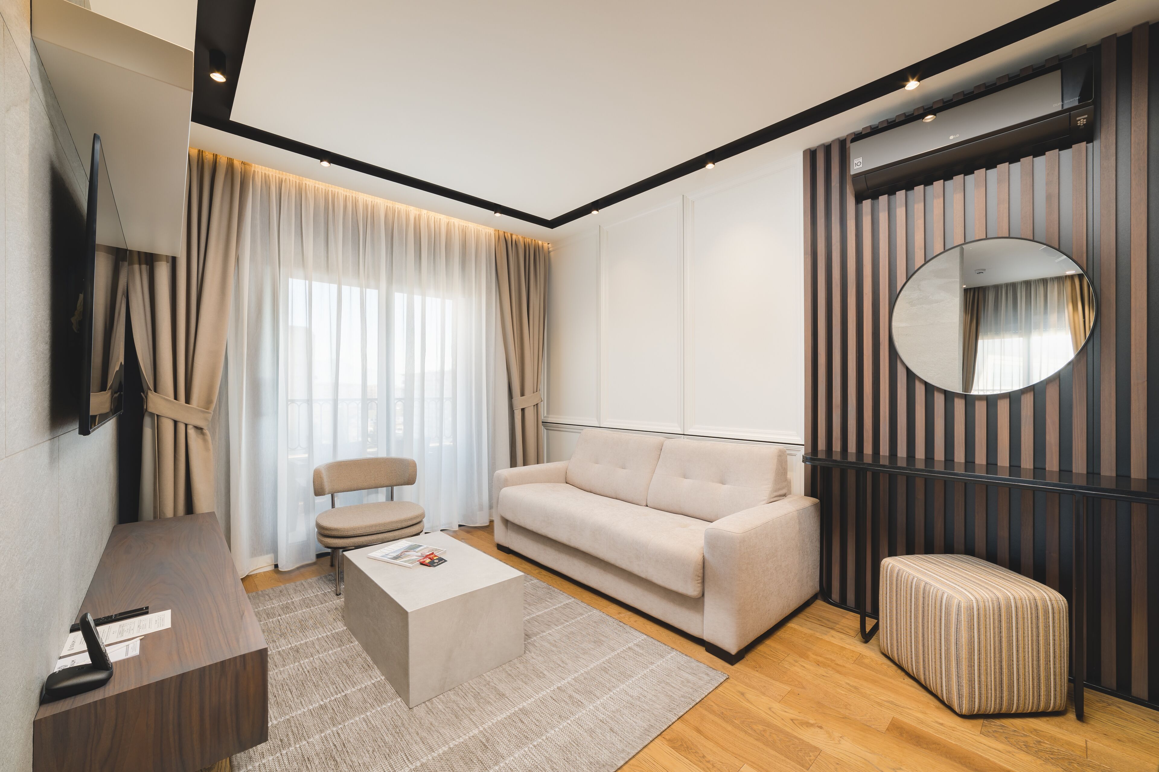 executive suite, 1 king bed with sofa bed | living area | 42-inch smart tv with digital channels, tv