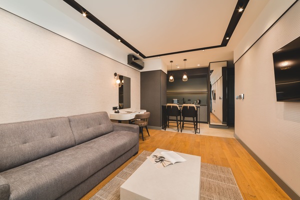 Standard Suite, Balcony, City View | Living area | 42-inch Smart TV with digital channels, TV