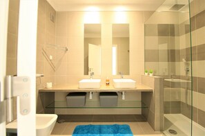 Bathtub, hair dryer, towels