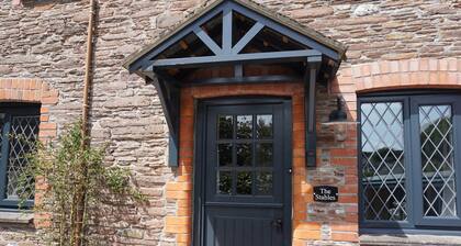 Situated in a quaint village-walking distance to Slapton Sands Beach & Ley.