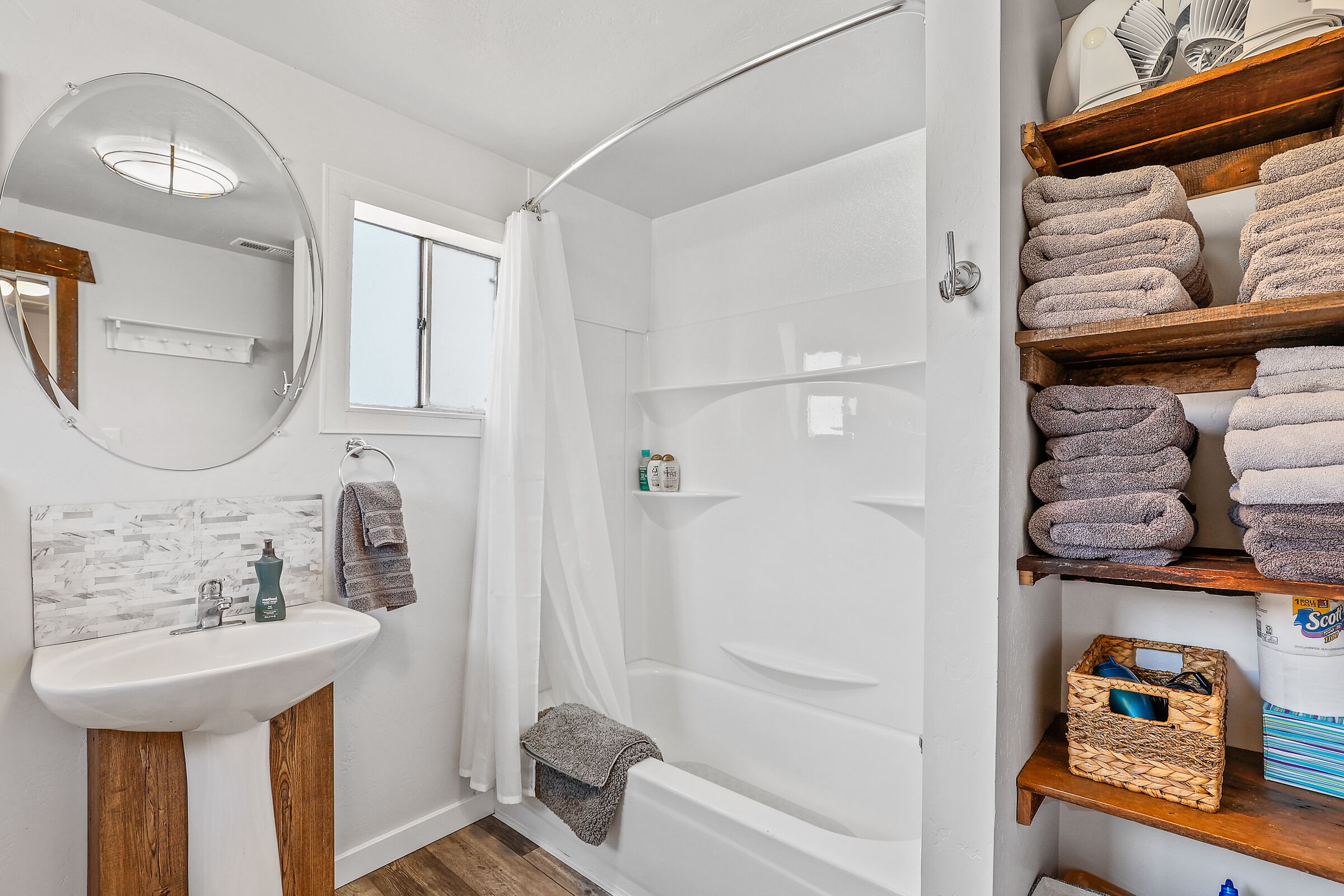 Combined shower/tub, hair dryer, towels, soap