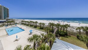A hotel with a swimming pool, beach access, and a view of the ocean. - Regency Isle 307 | Beachfront | Pools, Hot Tubs and more! | My Beach Getaways (Orange Beach)