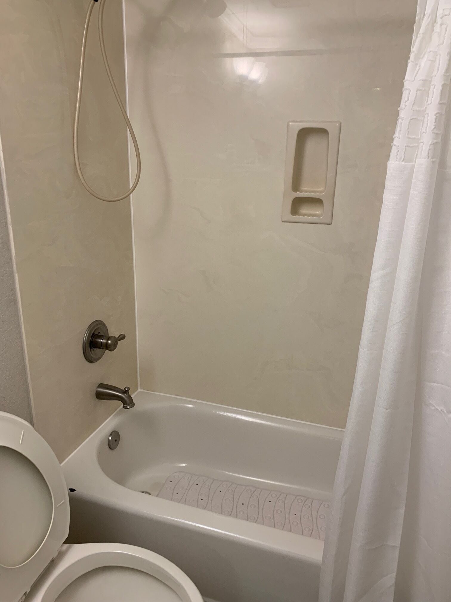 Combined shower/tub, hair dryer, towels, soap