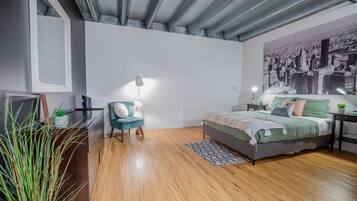 1 bedroom, desk, iron/ironing board, travel crib