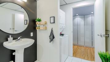 Combined shower/tub, hair dryer, towels, soap