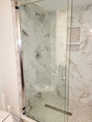 Combined shower/tub, hair dryer, towels, soap