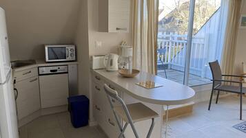 Réfrigérateur, four, lave-vaisselle, grille-pain